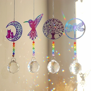 Detailed set of four crystal suncatchers featuring metal butterfly and tree of life designs