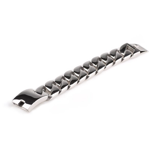 Macro shot of 32mm wide silver stainless steel Cuban link chain with glossy finish