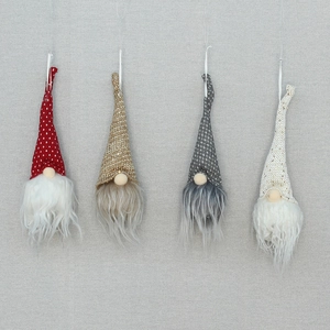 Set di quattro gnomi natalizi luminosi con cappelli glitterati e barbe morbide