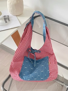 Red gingham canvas tote bag with blue denim bow pocket and drawstring closure