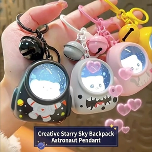 Creative astronaut space backpack keychains in four colors with bells and carabiners