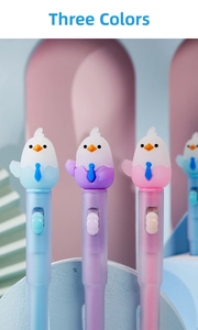Close-up of cute bird-themed glowing gel pens in pastel blue, purple, and pink colors