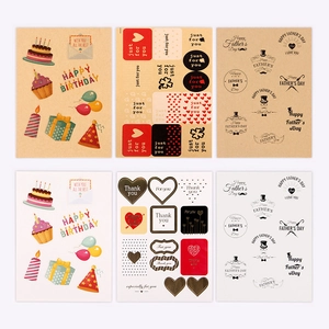 Detail view of assorted kraft and white gift tags with Happy Birthday and Father's Day prints