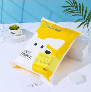 Detail of 60x120cm disposable pet bath towels in individual 10-pack packaging