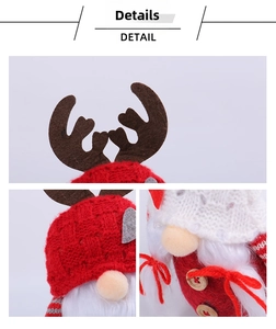 Detailed view of the Christmas gnome's knitted red hat with felt antlers and wooden buttons