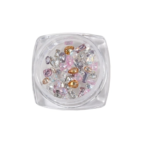 Mini flatback zircon nail art crystals in various shapes and colors in a transparent jar