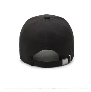 Rear view of black cotton baseball cap showing metal adjustable buckle and seam detail