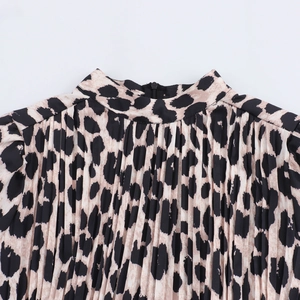 French vintage leopard print dress featuring high neck pleats and hidden back zipper
