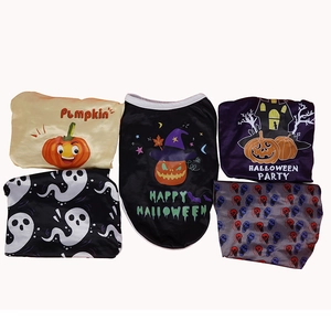Set of Halloween pet vests and bandanas with pumpkin prints for dogs and cats