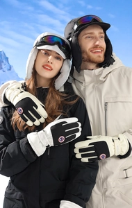 Macro detail of waterproof ski gloves featuring adjustable wrist straps and thermal lining