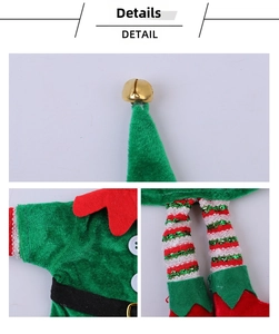 Detail view of elf wine bottle cover with green velvet, gold bells and striped legs
