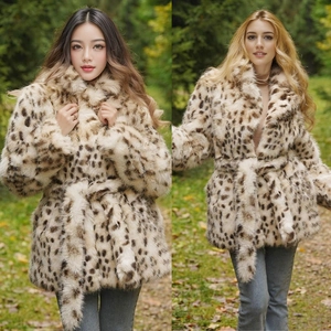 Detail showing faux fur leopard print texture and belted waist on mid-length coat