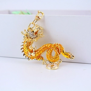 Golden Chinese dragon keychain featuring sparkling crystals and a durable metal ring