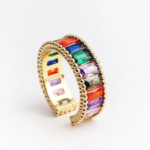 Adjustable gold ring featuring colorful zircon crystals and beaded edge design