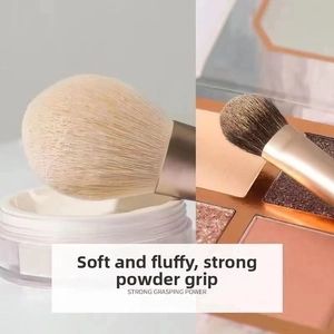 Detail view of morandi makeup brushes with gradient soft bristles and powder pick-up