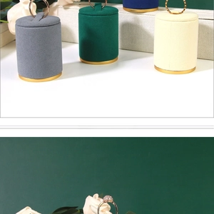 Macro shot of micro-suede velvet ring display stands on solid wood bases in various colors