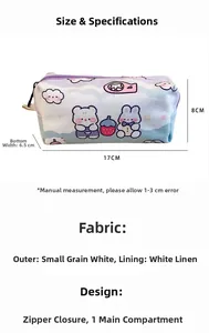 Detail view of cartoon canvas storage bag showing dimensions 17cm x 8cm x 6.5cm