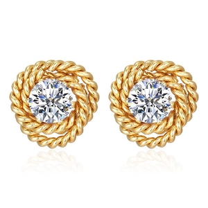 Retro gold rose twist stud earrings with large round zircon center on white background