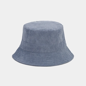 Close-up of gray-blue corduroy bucket hat showing detailed ribbed fabric texture