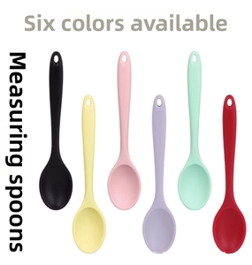 Colorful silicone solid cooking spoons in six vibrant colors with hanging hole handles