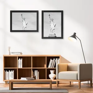 Modern living room wall decor with two black framed Statue of Liberty art prints