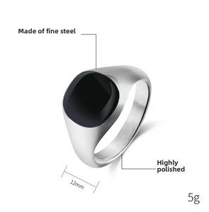 Detail showing 12mm width and 5g weight of polished black enamel signet ring