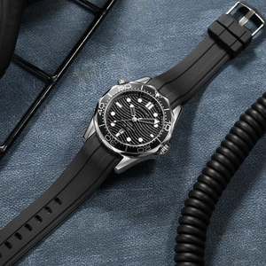 Men's diving watch with black wave dial and silver steel case on textured rubber strap