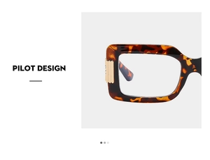 Detailed macro shot of tortoiseshell glasses frame with golden metal hinge decorations