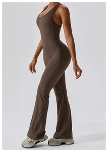 Side view of dark coffee flared yoga bodysuit showing body-sculpting and hip-lifting fit