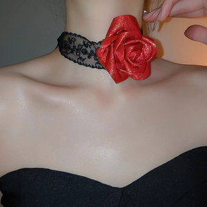 Detailed view of an elegant red lace choker featuring a large 3D metallic rose pendant