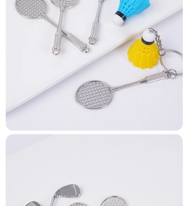 Miniature zinc alloy badminton and golf racket keychains set on a white tiered background