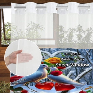 Sheer bird and flower printed shower curtain with metal grommets and 'All is love' text