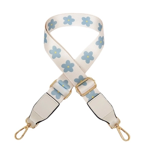 Adjustable floral crossbody bag strap with blue flower patterns and gold-tone hooks