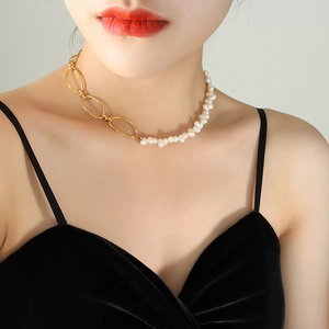 French baroque freshwater pearl necklace with gold oval chain link on female model