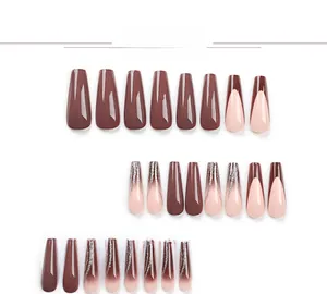 Detail view of 24pcs long coffin press-on nails with brown and pink French glitter tips