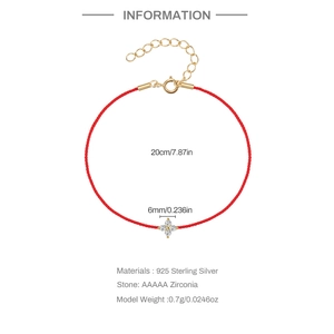 Detail showing 925 silver flower charm with zircon on red rope bracelet with sizing info