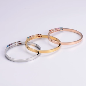 Minimalist rainbow gemstone bangles in silver gold and rose gold stainless steel finishes