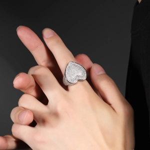Close-up of hip hop copper ring featuring a large heart-shaped 3A zircon pave setting
