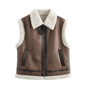 Detail of brown faux suede biker vest with fuzzy shearling lining and zipper