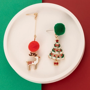 Asymmetric Christmas earrings featuring red pompom reindeer and green pompom tree pendants