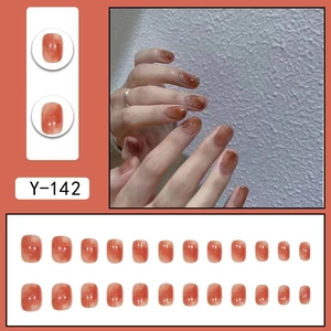 Amber marble press-on nails in short round shape with golden edges style Y-142