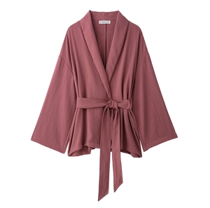 Women's dark red linen kimono wrap top with wide sleeves and matching belt on white background