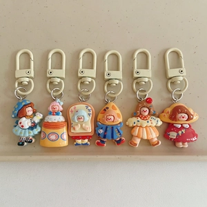 Set of 6 cute cartoon girl food-themed keychains for backpacks in assorted designs