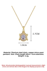 Detailed view of turtle pendant necklace with purple gemstone and micro-inlaid zircon