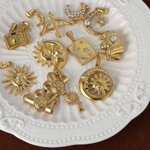 24K gold plated stainless steel pendants featuring sun, moon, star, and camera shapes