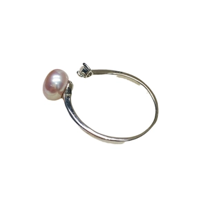 Adjustable silver ring with round pink freshwater pearl and sparkling zircon accent