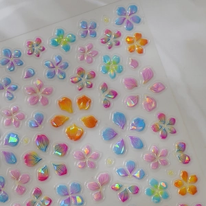 3D iridescent floral nail art stickers with embossed colorful flower petal designs