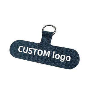 Adjustable dark blue fabric phone lanyard patch with a durable silver metal D-ring