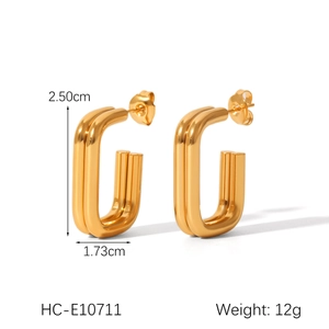 Detail view of gold double-layer rectangular hoop earrings with dimensions 2.50cm x 1.73cm