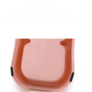 Close-up of pink pet bowl base with anti-slip rubber feet for stability and floor protection